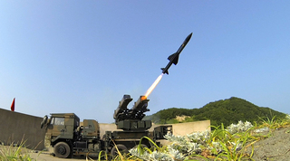 Type_11_(SAM)_firing,_Japan_GSDF.jpg