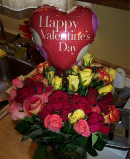 Valentine Flowers with colorful roses with heart balloon.PNG