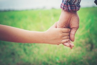 close-up-of-father-holding-his-daughter-hand-so-sweet-family-ti_1150-846.jpg