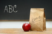 depositphotos_3266859-Paper-lunch-bag-on-desk.jpg