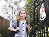 depositphotos_33834101-stock-photo-elementary-schoolgirl-near-school-gate.jpg