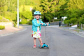 depositphotos_73982243-stock-photo-preschooler-girl-riding-scooter-on.jpg