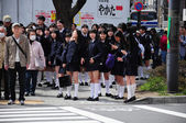 depositphotos_81414424-Japanese-student-waiting-at-the.jpg