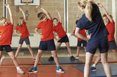 depositphotos_86656100-Teacher-taking-exercise-class-in.jpg