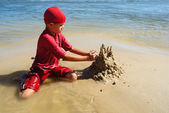 depositphotos_9819142-Playing-on-the-beach.jpg