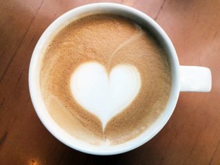 depositphotos_56418341-stock-photo-cup-of-latte-art-coffee.jpg
